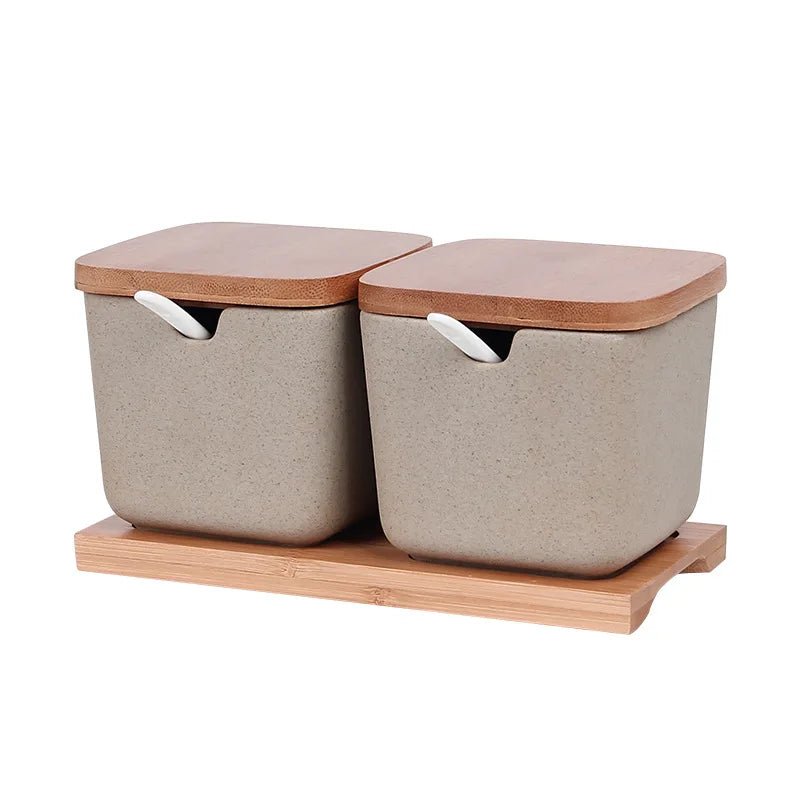 Two sets of ceramic seasoning jars with wooden lids, neatly arranged