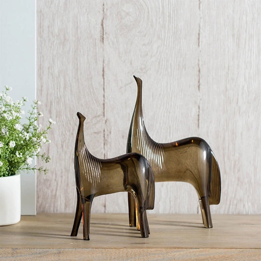 Abstract resin sculpture of horse couple and foal, minimalist geometric design perfect for adding a modern touch to contemporary home decor.