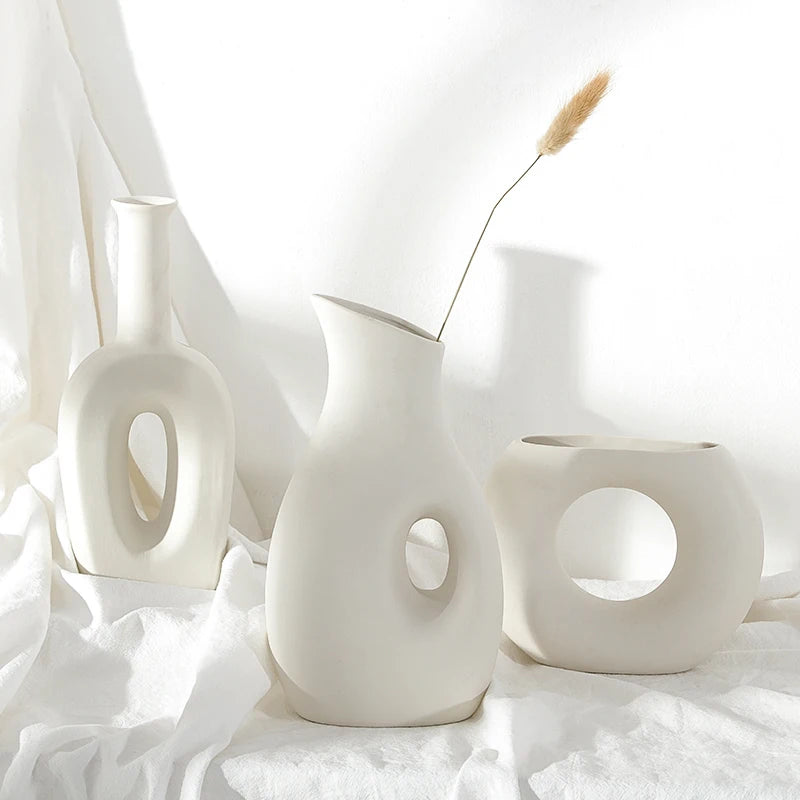 Set of 6 aesthetic white ceramic vases for modern home décor – handcrafted, minimalist vases for tabletop or hydroponic displays.