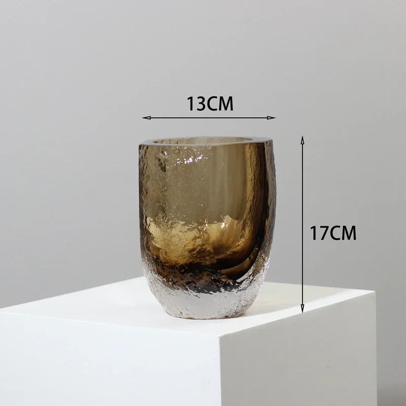 Short round glass bowl with warm amber tones and soft texture, ideal for home decor.