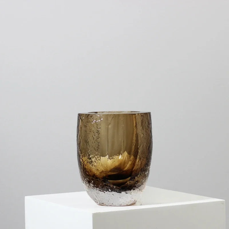 Short round glass bowl with warm amber tones and soft texture, ideal for home decor.