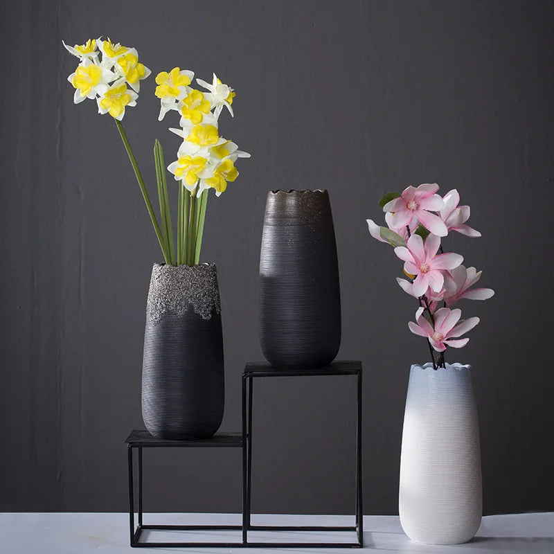 Handcrafted modern ceramic vase with a unique artisan design, featuring smooth curves and a minimalist aesthetic