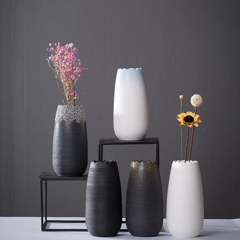 Handcrafted modern ceramic vase with a unique artisan design, featuring smooth curves and a minimalist aesthetic