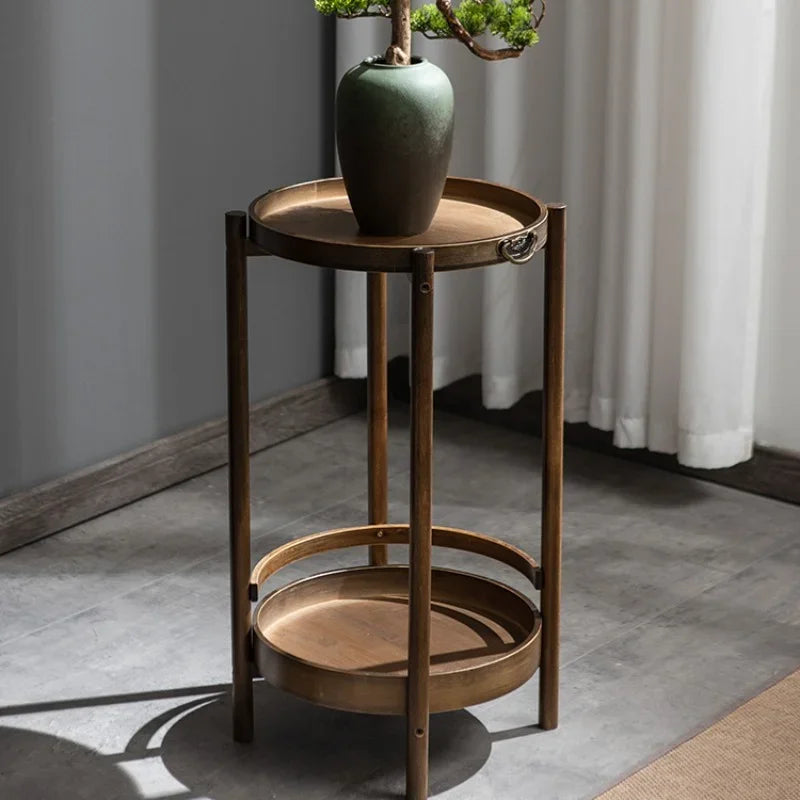 Bamboo stand with multi-layer shelves, perfect for plants, décor, or as a coffee table, combining classic Chinese design with modern function.