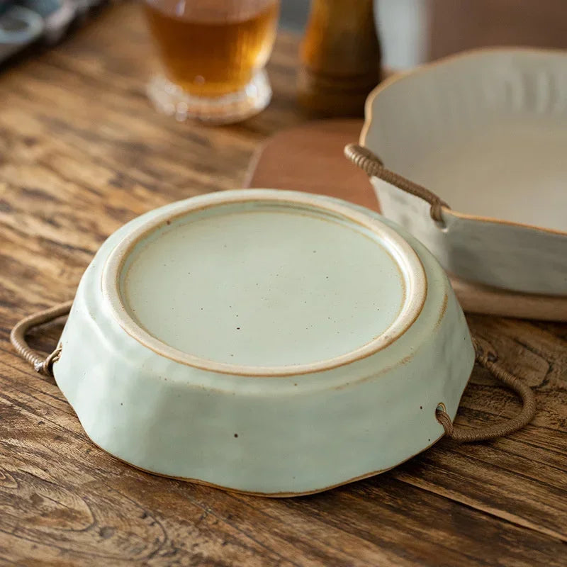 Retro Clay Serving Bowl with Handles in a rustic setting, perfect for serving soups, salads, or as a centerpiece.