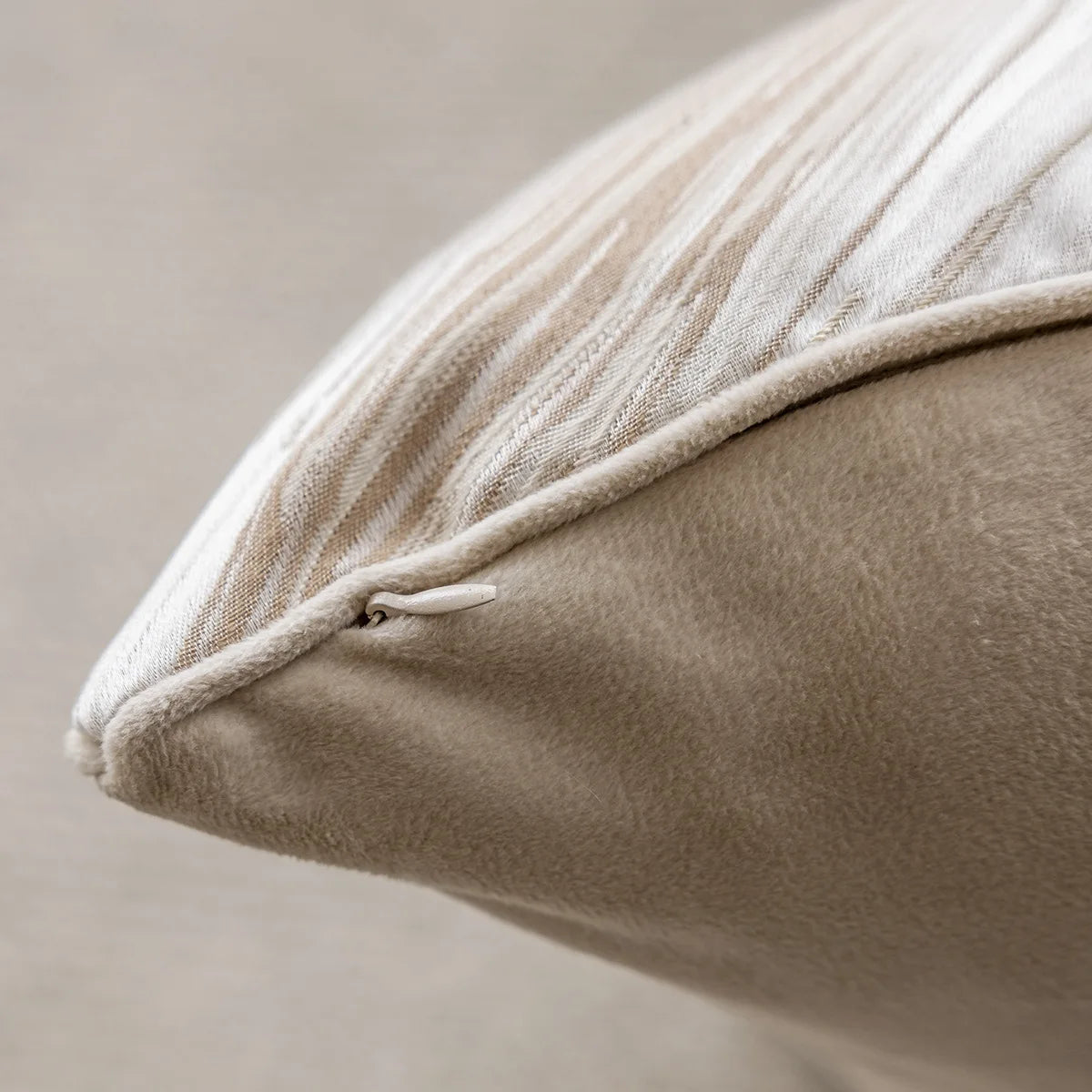 Beige light luxury cushion cover featuring a soft texture and elegant design, perfect for adding a touch of sophistication to any living space.