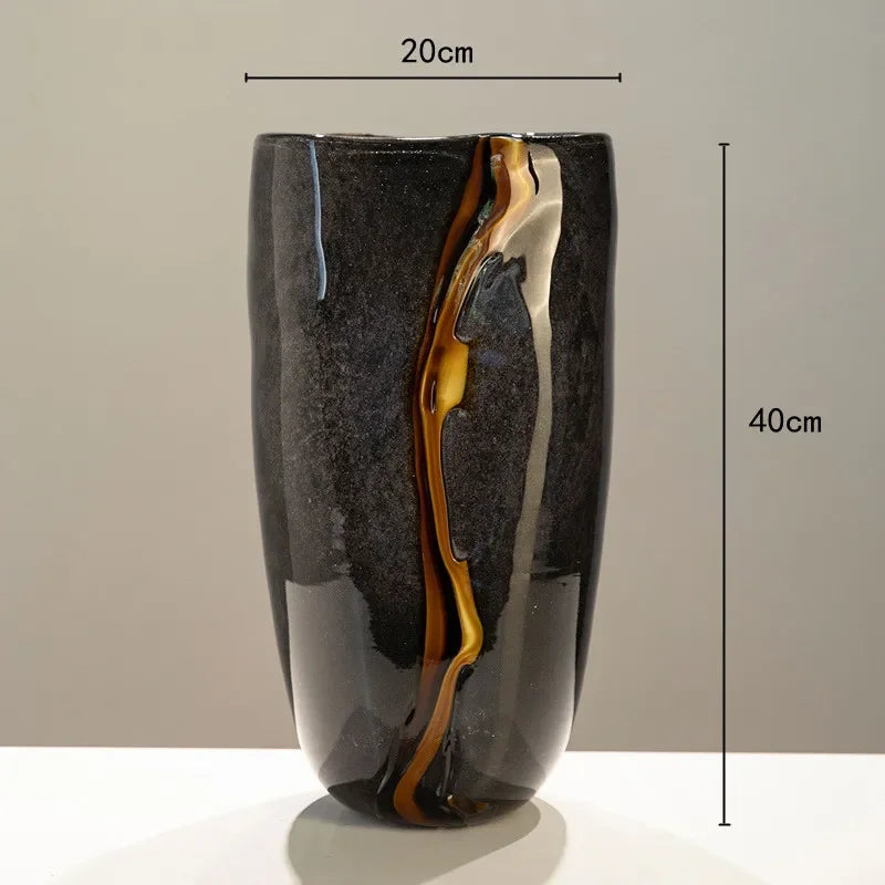 Black ripple glass vase with mustard-yellow wave detailing