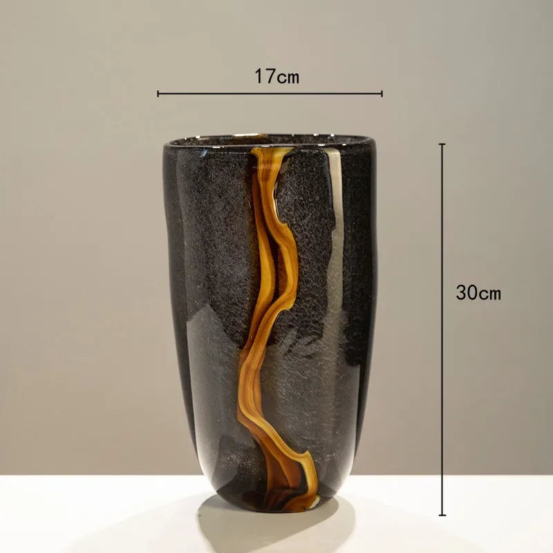 Black ripple glass vase with mustard-yellow wave detailing