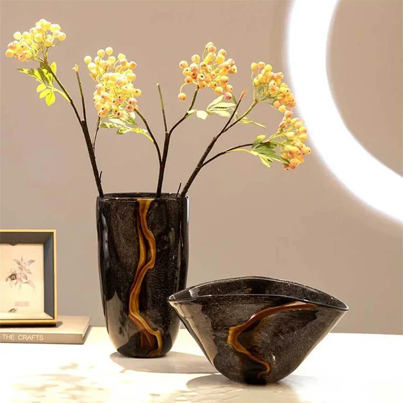 Black ripple glass vase with mustard-yellow wave detailing