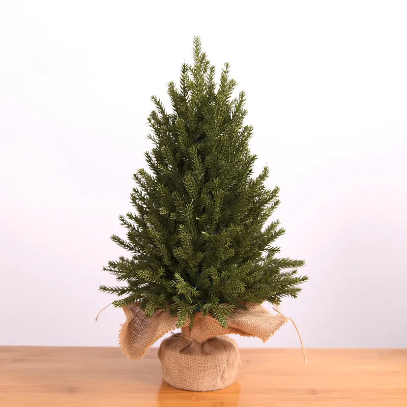 Cosy mini artificial Christmas tree with rustic charm for home decoration, available in two sizes.