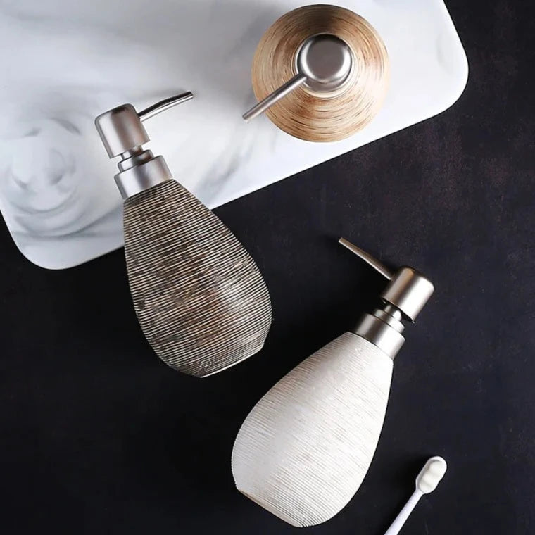 Elegant Ceramic Lotion & Soap Dispenser in modern design, suitable for lotion, shower gel, or hand sanitizer.