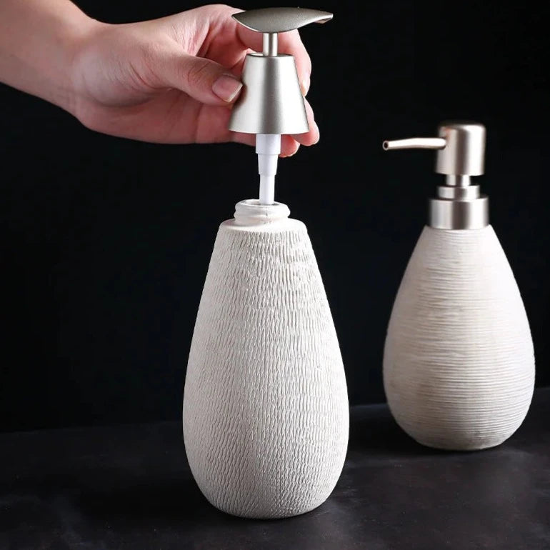 Elegant Ceramic Lotion & Soap Dispenser in modern design, suitable for lotion, shower gel, or hand sanitizer.