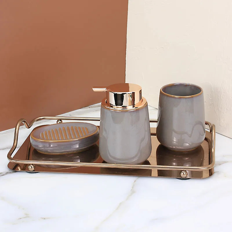 Elegant Rustic Ceramic Bathroom 4-Piece Set with soap dish, toothbrush holder, soap dispenser, and stainless steel tray.