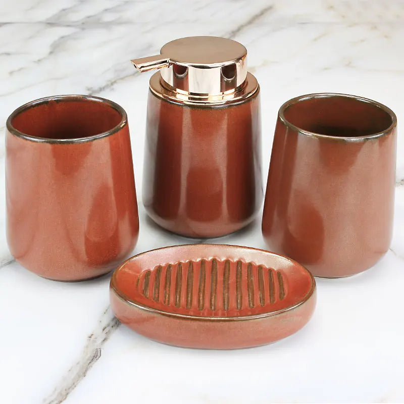 Elegant Rustic Ceramic Bathroom 4-Piece Set with soap dish, toothbrush holder, soap dispenser, and stainless steel tray.