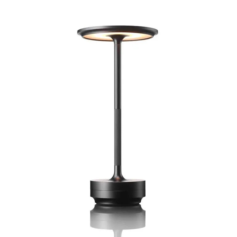 Elegant Touch Switch Table Lamp providing stylish lighting in a modern living room setting.