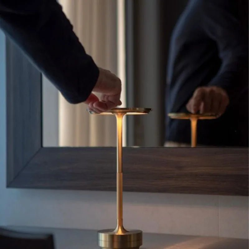 Elegant Touch Switch Table Lamp providing stylish lighting in a modern living room setting.