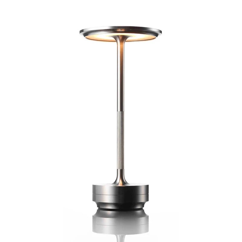 Elegant Touch Switch Table Lamp providing stylish lighting in a modern living room setting.