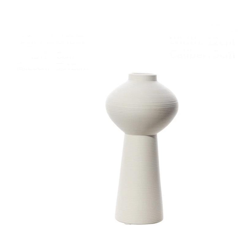 Elegant white brushed ceramic vase iin a white background.