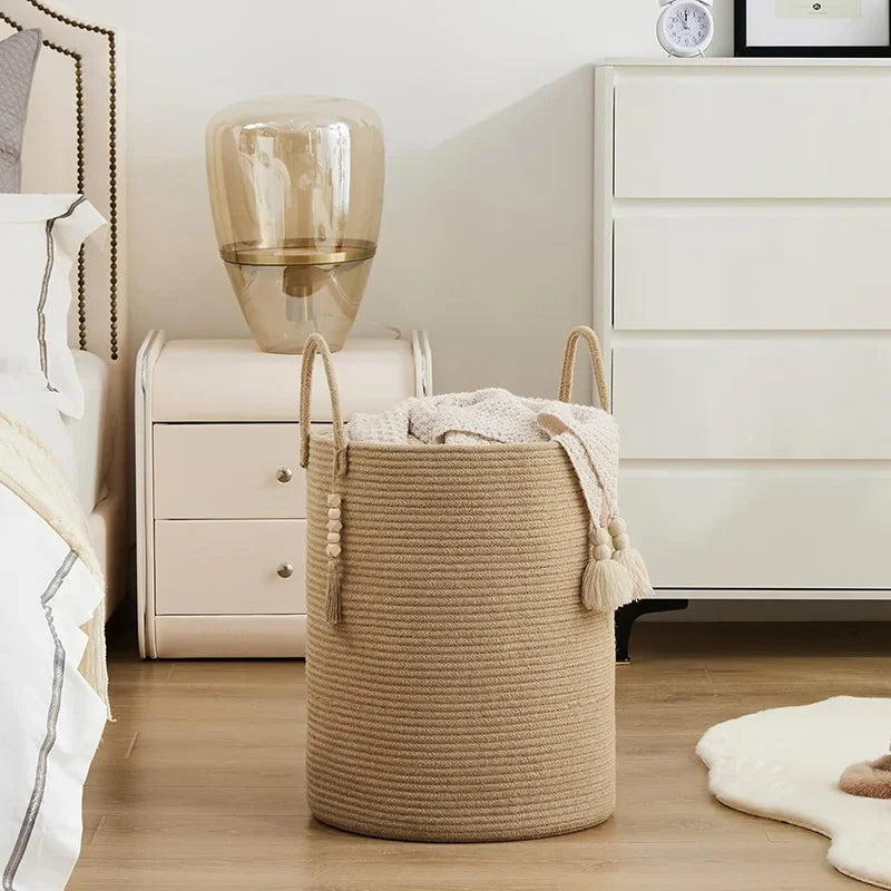 A large laundry hamper designed for family use, perfect for holding clothes and laundry items.