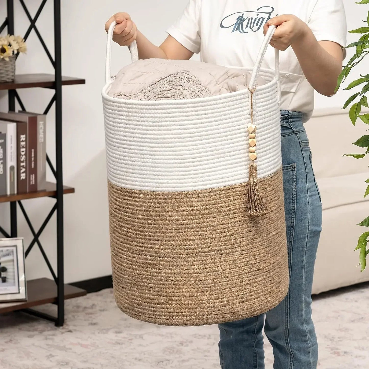 A large laundry hamper designed for family use, perfect for holding clothes and laundry items.