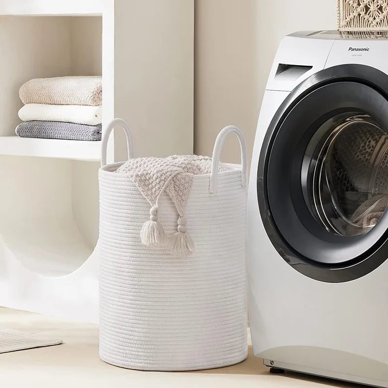 A large laundry hamper designed for family use, perfect for holding clothes and laundry items.