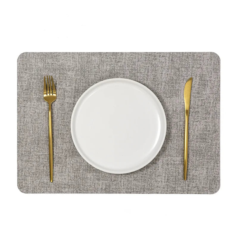 A faux letaher texture placemat on a dining table, perfect for protecting surfaces and adding a natural touch to your decor.