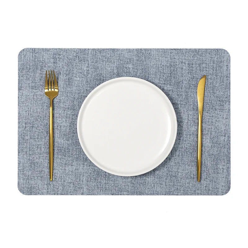 A faux letaher texture placemat on a dining table, perfect for protecting surfaces and adding a natural touch to your decor.