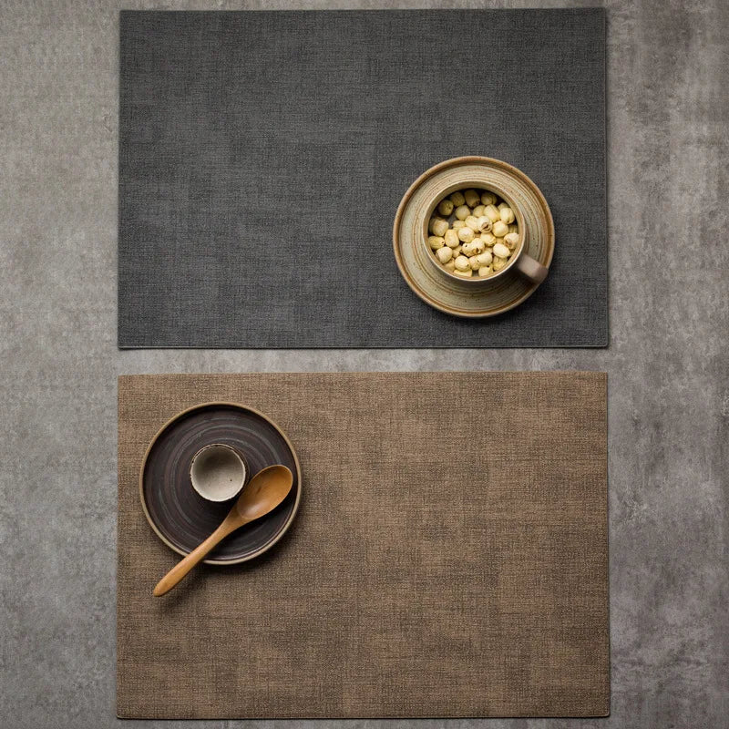 A faux letaher texture placemat on a dining table, perfect for protecting surfaces and adding a natural touch to your decor.