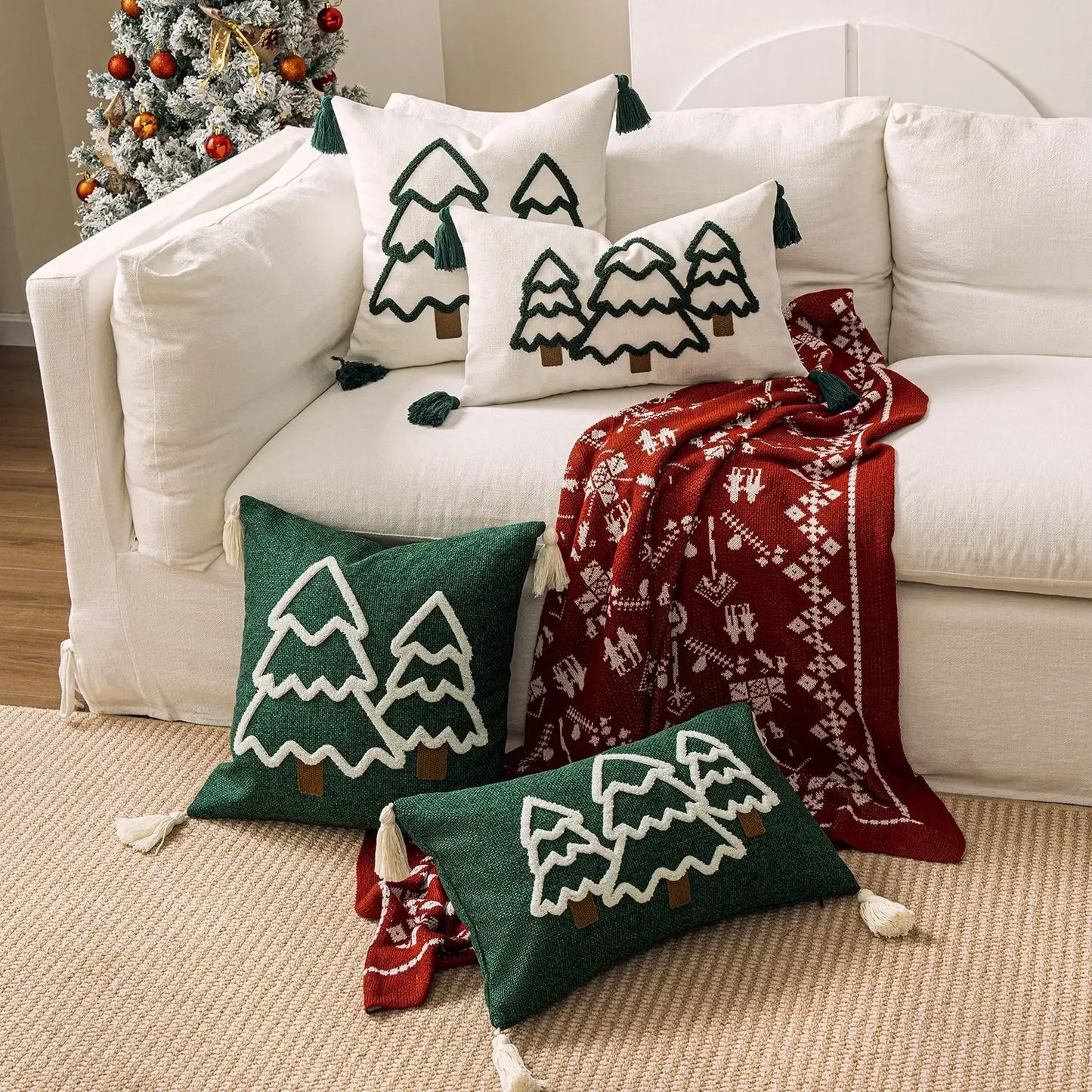 Festive tree pillow covers with holiday design, green and red Christmas decoration for living room or bedroom.