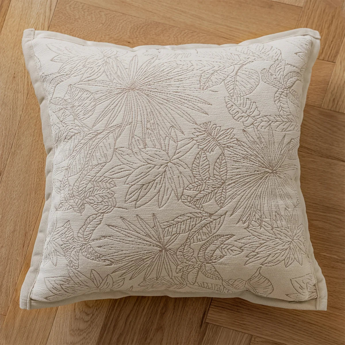 French cream-style jacquard pillow cover with beige tones and delicate floral and leaf patterns, perfect for adding a touch of charm and sophistication to sofas or living rooms.