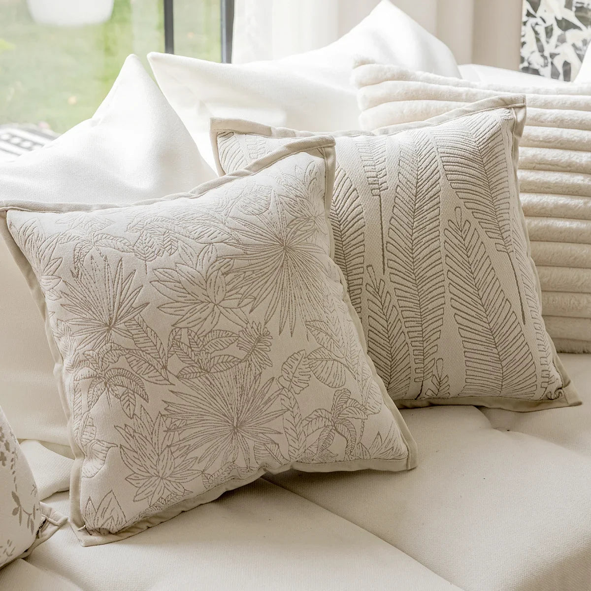 French cream-style jacquard pillow cover with beige tones and delicate floral and leaf patterns, perfect for adding a touch of charm and sophistication to sofas or living rooms.