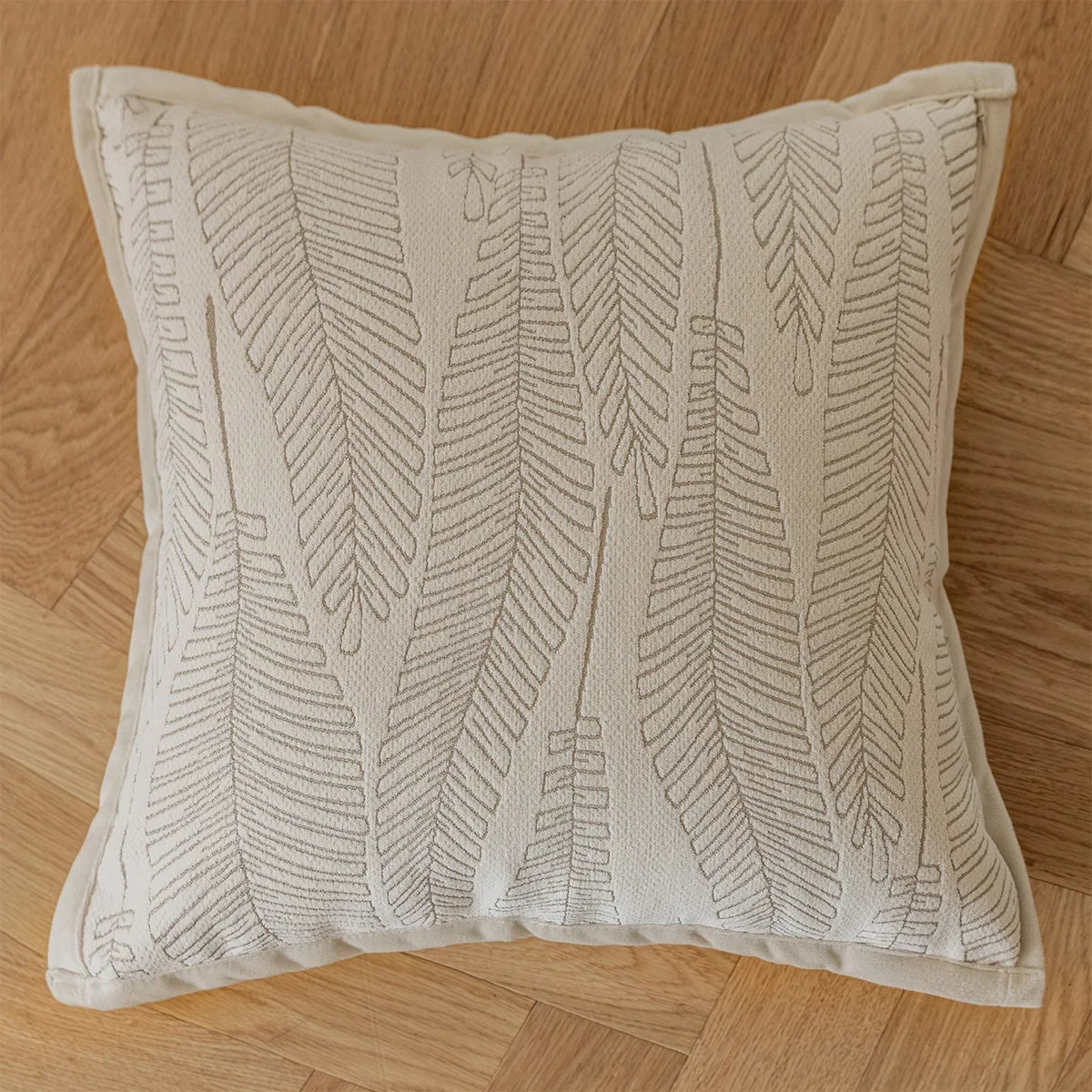 French cream-style jacquard pillow cover with beige tones and delicate floral and leaf patterns, perfect for adding a touch of charm and sophistication to sofas or living rooms.