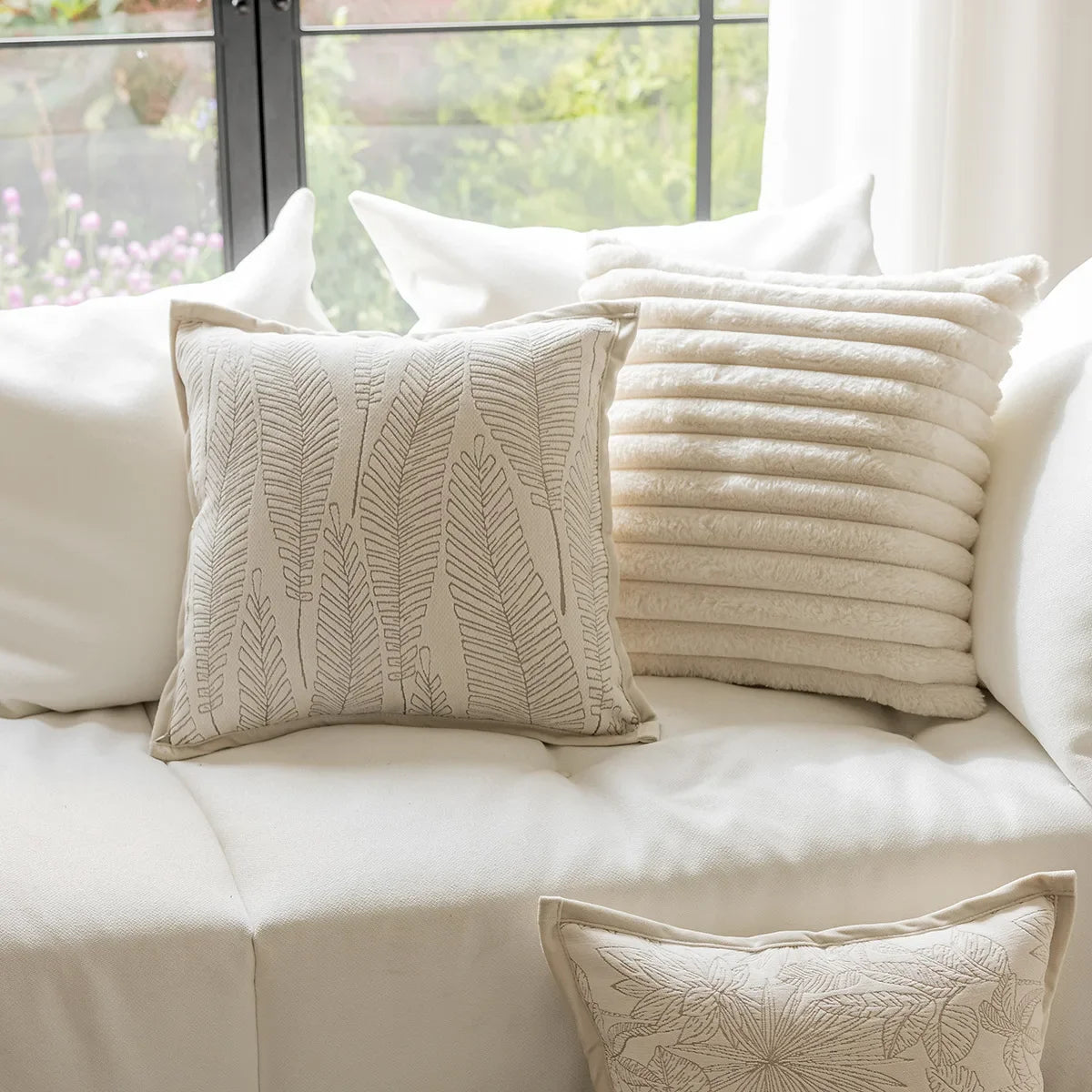 French cream-style jacquard pillow cover with beige tones and delicate floral and leaf patterns, perfect for adding a touch of charm and sophistication to sofas or living rooms.