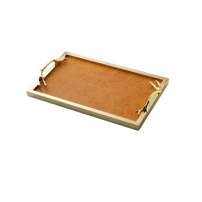 Golden Frame Leather Decorative Tray with Handle, enhancing a modern living room with elegance and functionality.