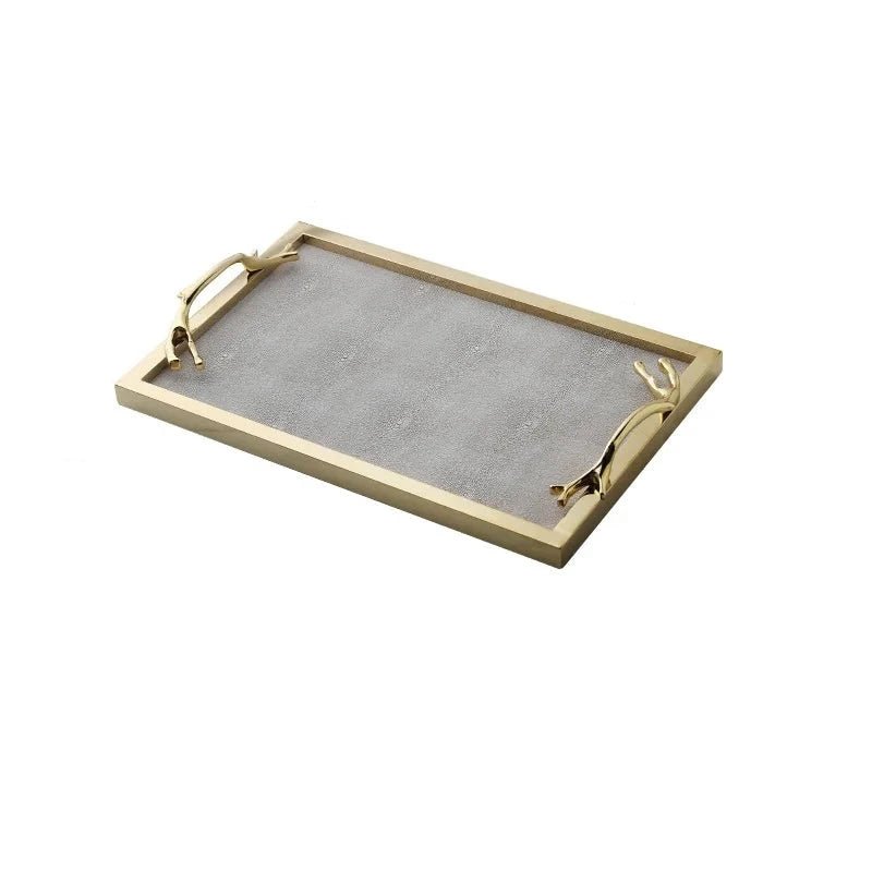 Golden Frame Leather Decorative Tray with Handle, enhancing a modern living room with elegance and functionality.