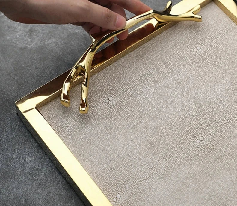 Golden Frame Leather Decorative Tray with Handle, enhancing a modern living room with elegance and functionality.