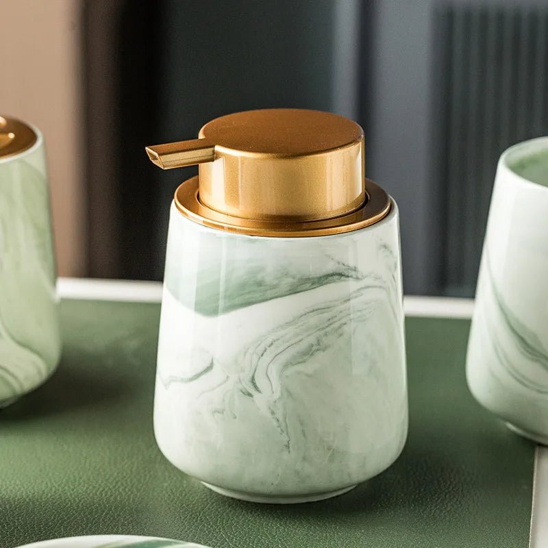 A stylish green ceramic soap dispenser with a sleek design