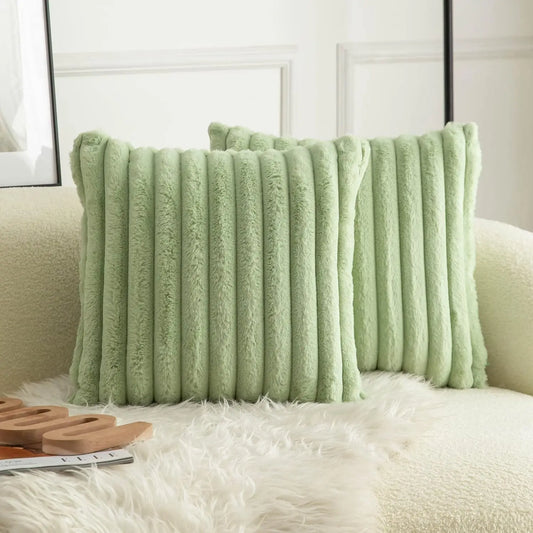 Green cushion covers with soft, plush fabric and minimalist striped design, perfect for adding comfort and style to sofas, living rooms, or cars.