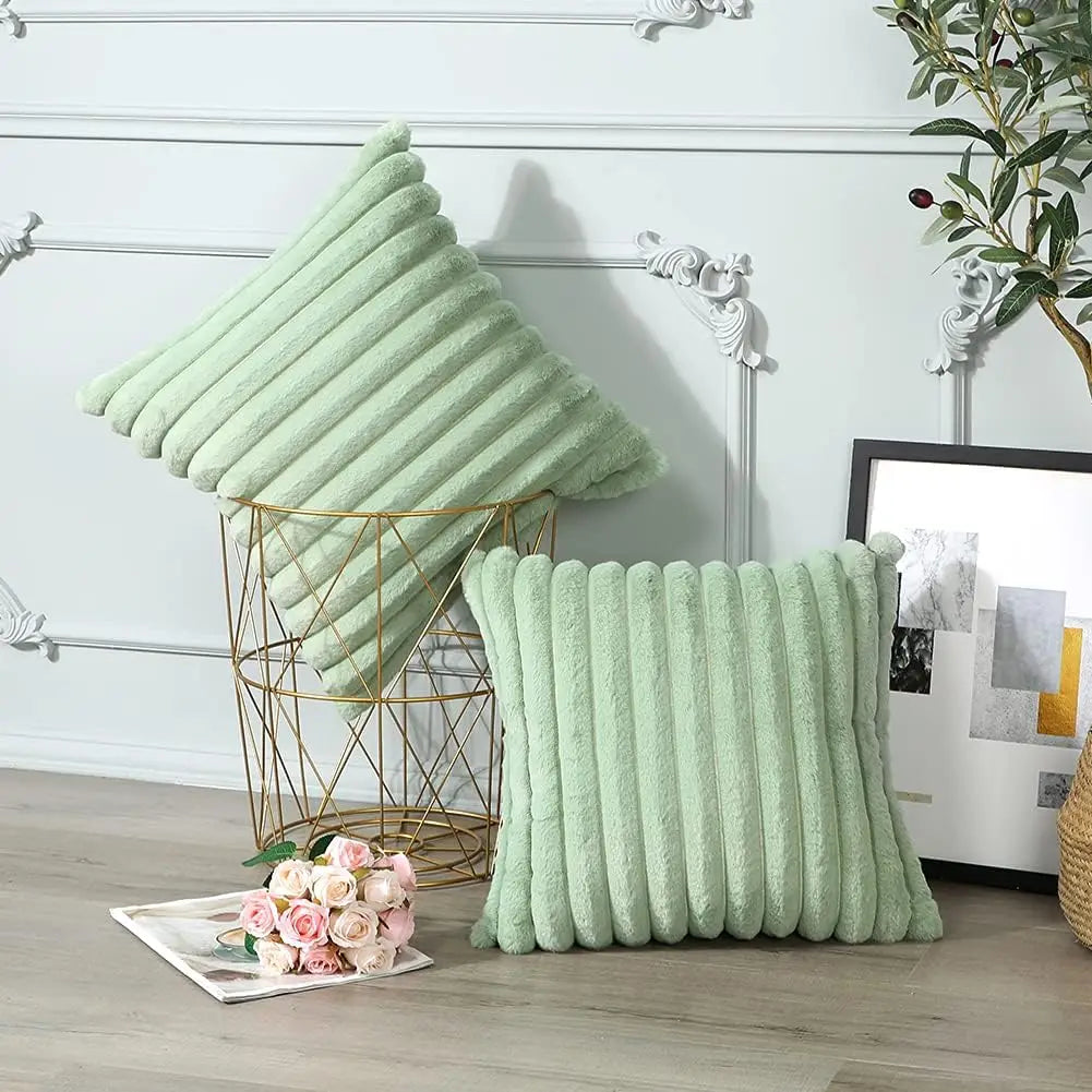 Green cushion covers with soft, plush fabric and minimalist striped design, perfect for adding comfort and style to sofas, living rooms, or cars.