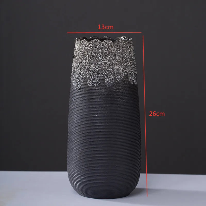 Handcrafted modern ceramic vase with a unique artisan design, featuring smooth curves and a minimalist aesthetic