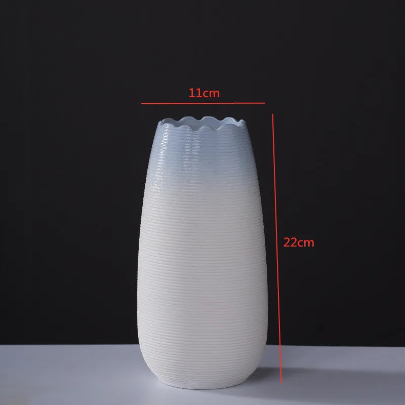 Handcrafted modern ceramic vase with a unique artisan design, featuring smooth curves and a minimalist aesthetic