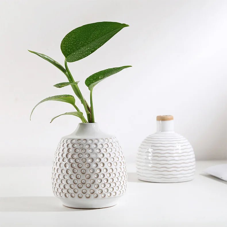 A creative ceramic vase showcasing an elegant and artistic arrangement perfect for home decor.