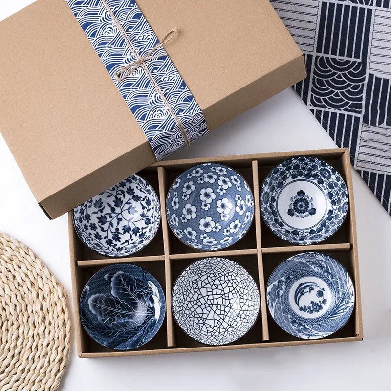 A set of six Japanese stylish bowls neatly arranged on a table.