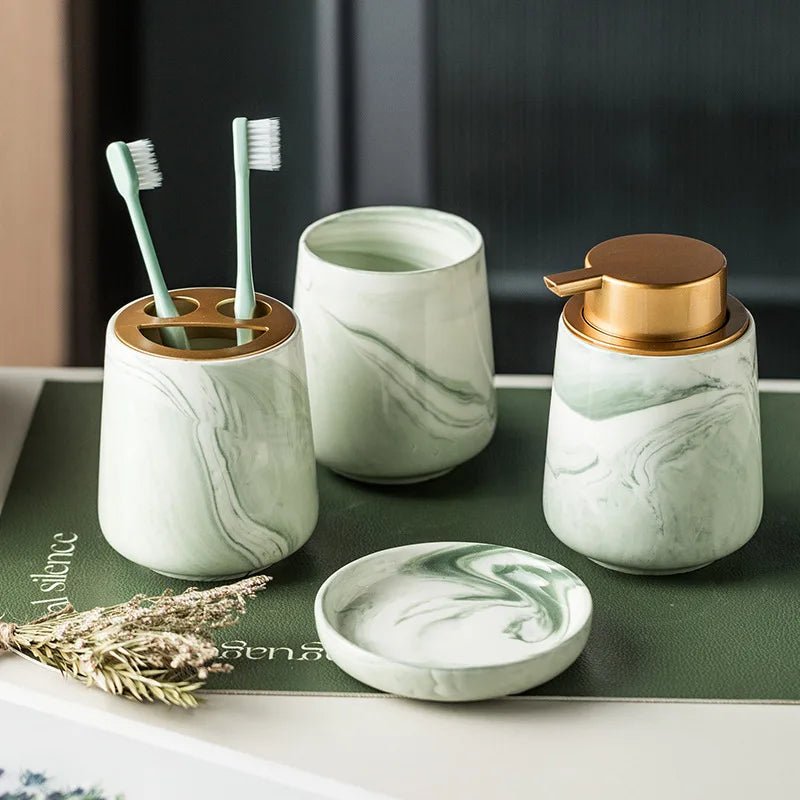 Marble Bathroom Accessories Set with 4 pieces including a toothbrush holder, soap dish, soap dispenser bottle, and tumbler