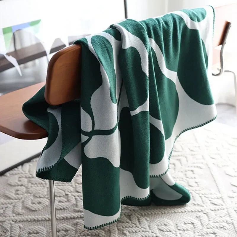 Minimalist cozy comfort patterned blanket with a soft, warm design ideal for enhancing home decor.