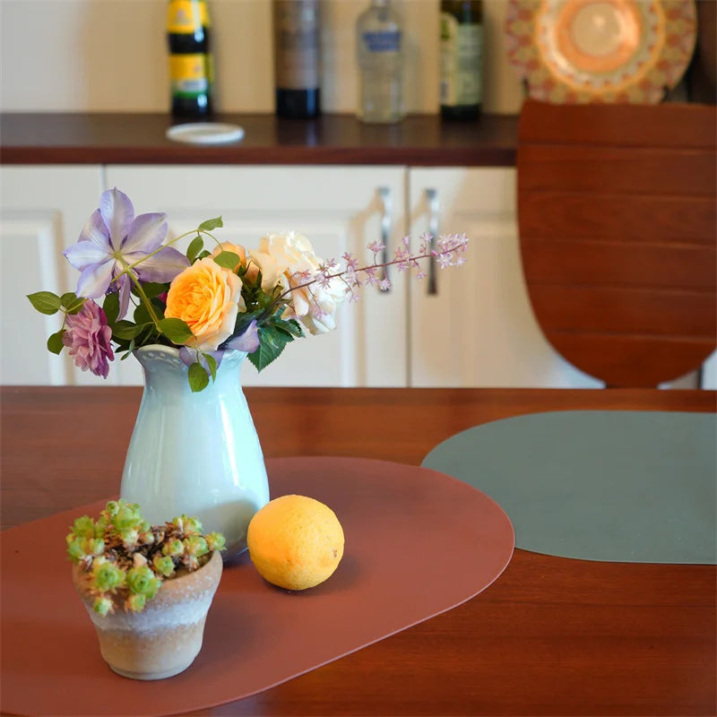 Minimalist Leather Placemat on a dining table, showcasing a sleek and modern design.