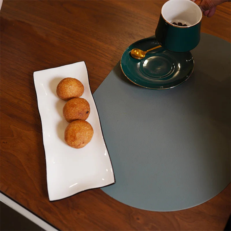 Minimalist Leather Placemat on a dining table, showcasing a sleek and modern design.