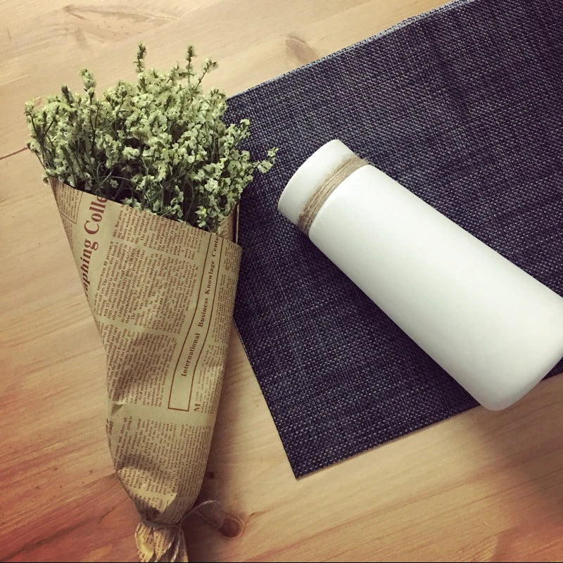 Minimalist twine design vase in natural tones, perfect for adding a rustic and elegant touch to any home decor