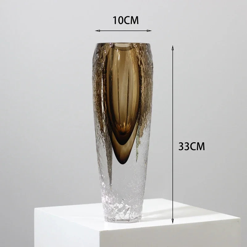 Tall smoky brown glass vase with smooth and textured finish, perfect for flowers or display.