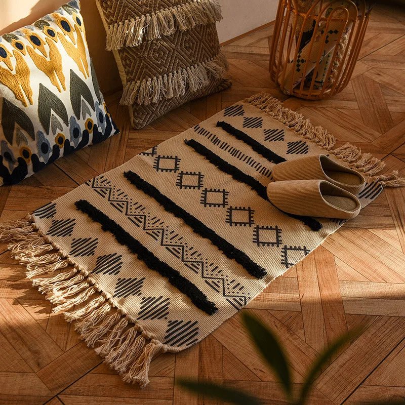 A modern weave rug made of cotton and linen, featuring tassel details.